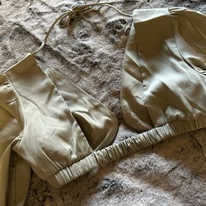 Sage green satin top. Wrist ties. Flared sleeves. Brand new.